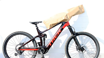 Paper bag protecting bike handle