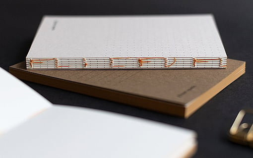 Notebooks created on PERGRAPHICA® uncoated design paper with open thread-stitch binding