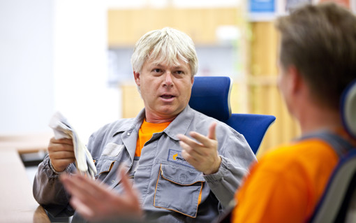 Male employee explaining