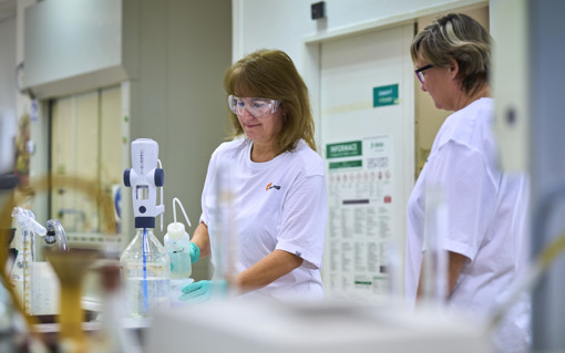 two women researchers in factory