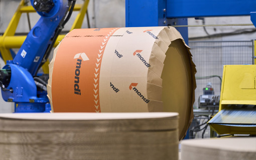 A roll of freshly produced paper ready for converting into packaging materials.