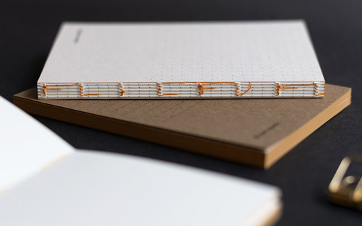 Notebooks created on PERGRAPHICA® uncoated design paper with open thread-stitch binding