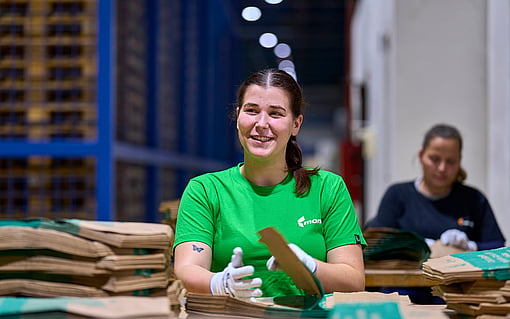 Mondi production worker sorting paper bags