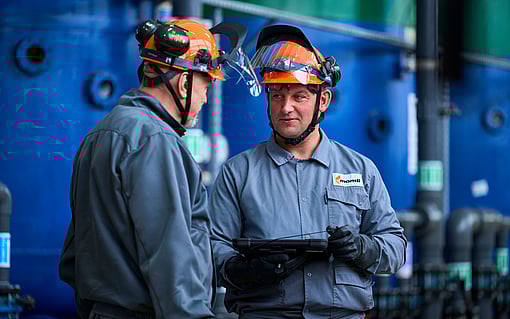 production workers with safety gear