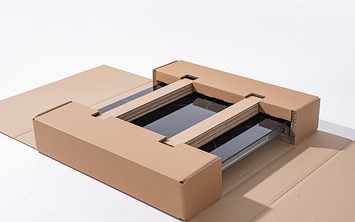 Packaging for ovens or hobs made from corrugated cardboard.