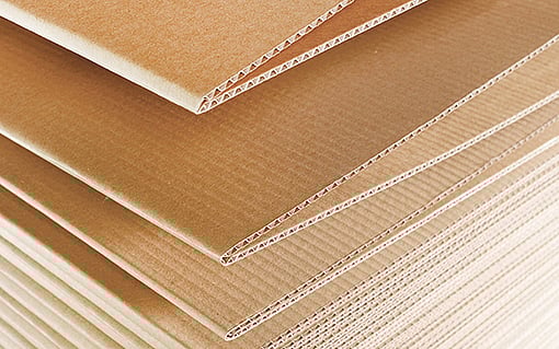 An image of a stack of fanfold corrugated board.
