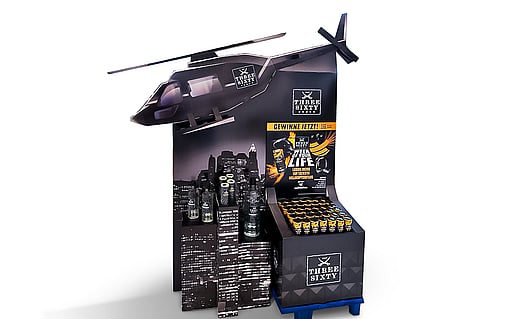 An image of a custom paper-based display solution featuring a helicopter-shaped design at the top.