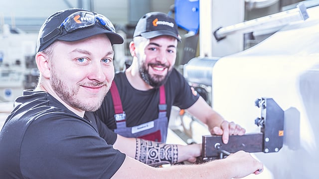 Two male operations workers