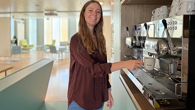 Melanie grabbing a coffee