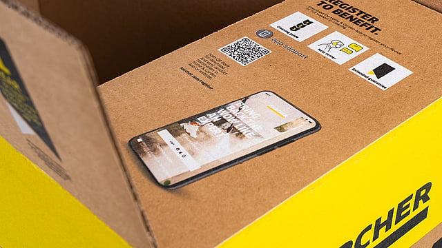 large cardboard box with an image of a mobile phone printed on it
