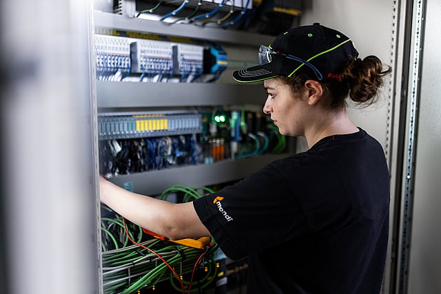 female colleague at machine