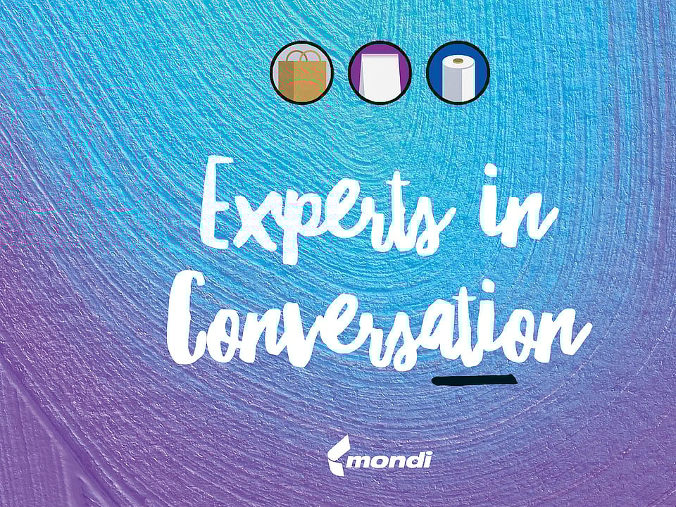 Experts in conversation written on blue background.