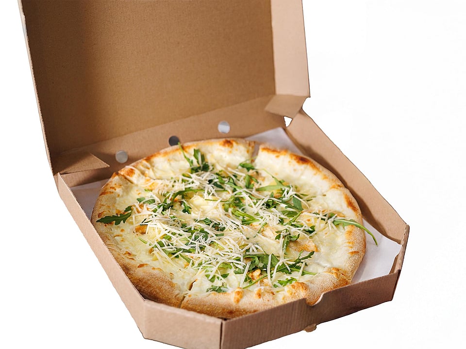 A pizza box with a pizza.