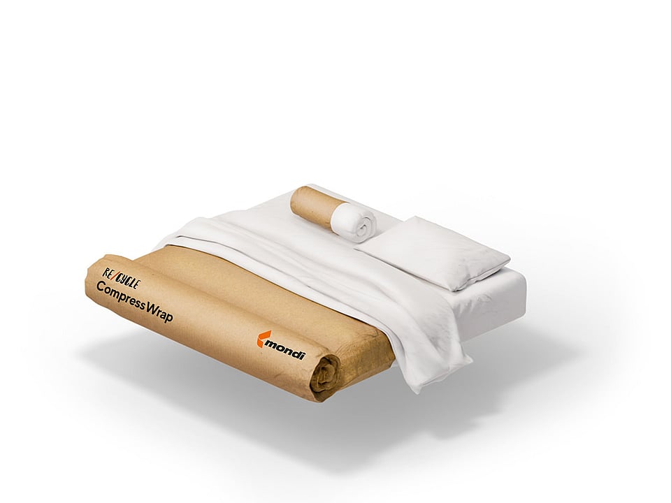 bed wrapped in paper