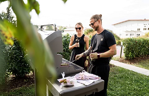 two colleagues at a barbeque