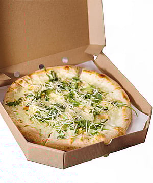 A pizza box with a pizza.