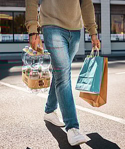 A man carrying his groceries.