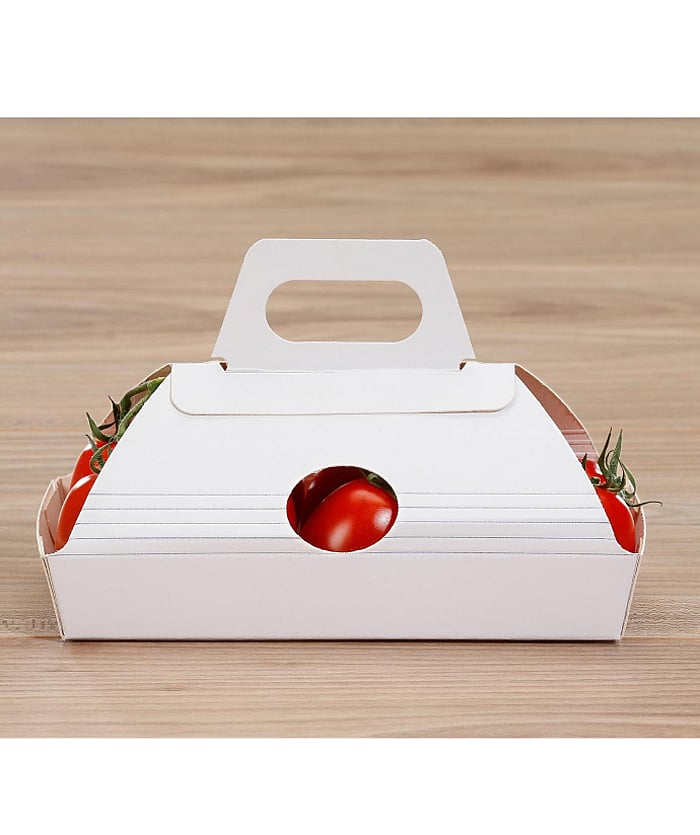 A small tray with tomatoes and a handle.