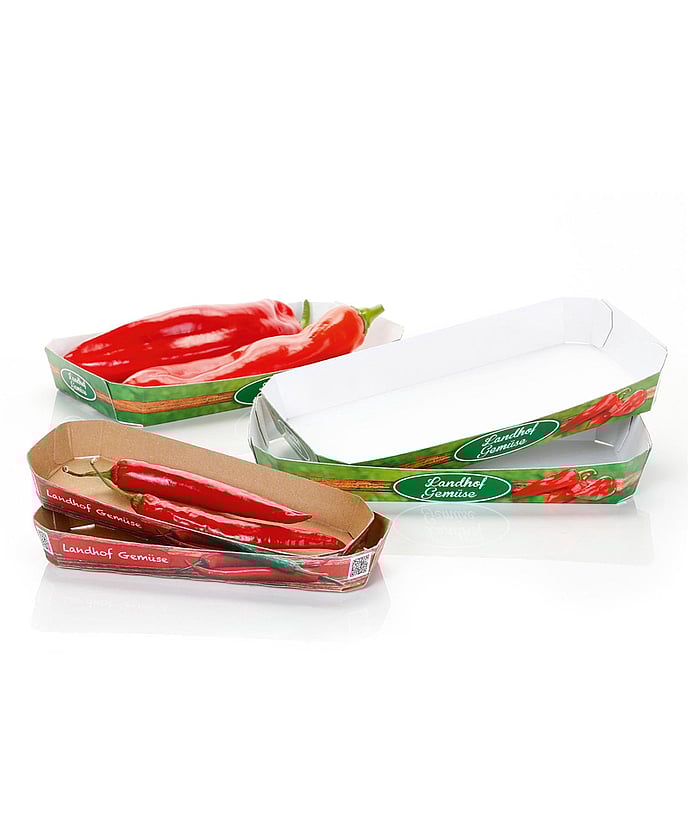 Small trays with fresh vegetables.