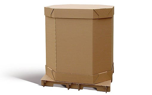 Warehouse employee on a forklift filling products into a corrugated octabin container.