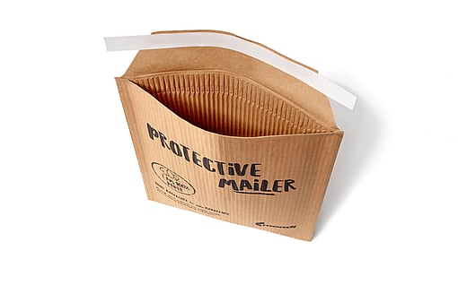An open Protective Mailer standing up showing the paper-based padding material.